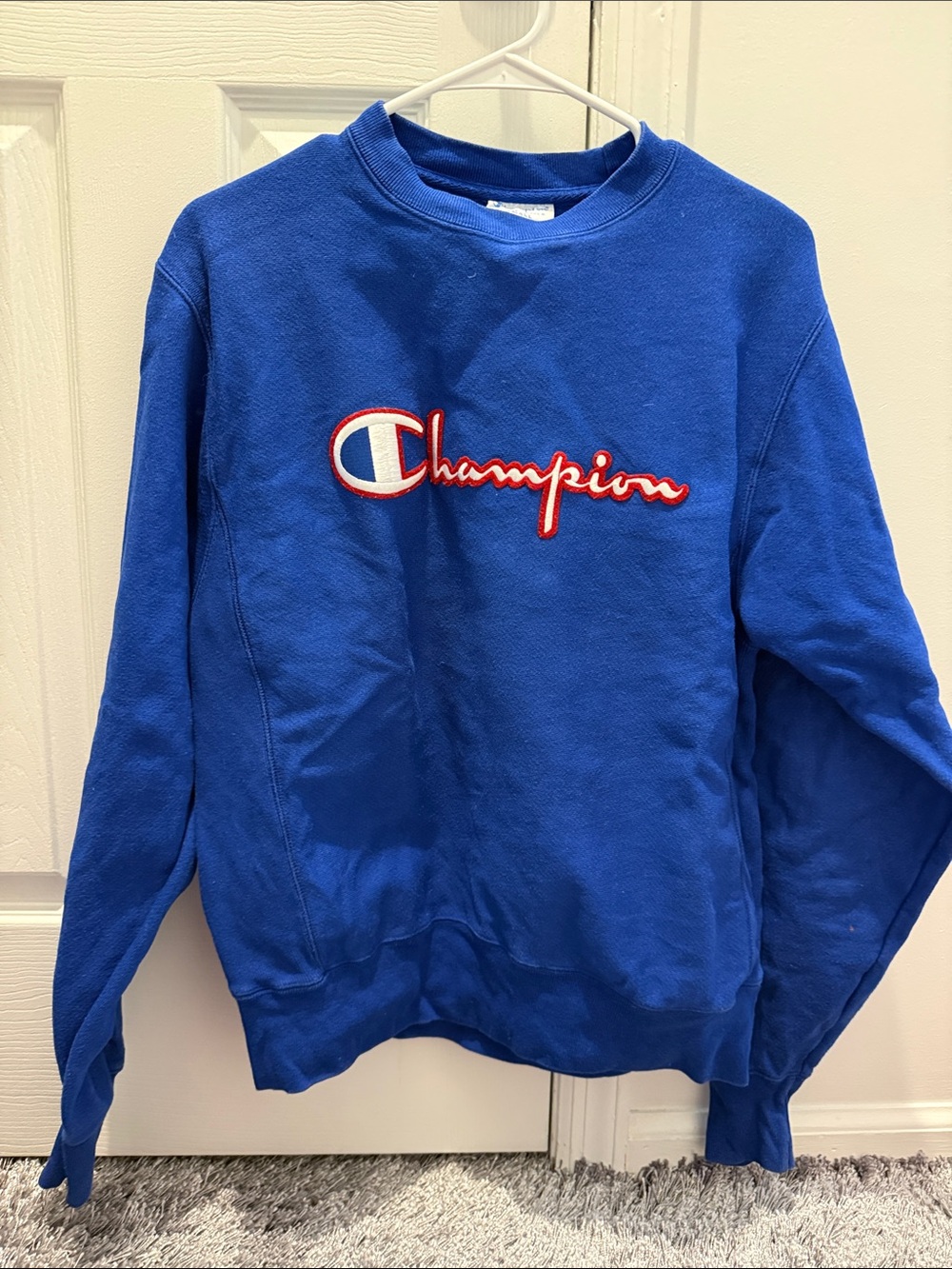 Champion Royal Blue Crewneck with Red & White Script. Size small